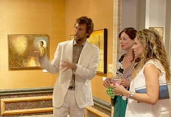 Discussing the paintings